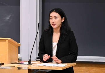 Alice Park stands behind a podium.