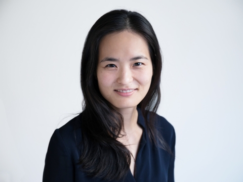 Portrait of Sarah Seo in black against a white background. 