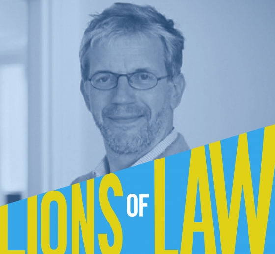 Lions of Law photo with bearded man in glasses 