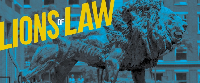 A statue of the Columbia lion emblazoned with the words Lions of Law in yellow letters