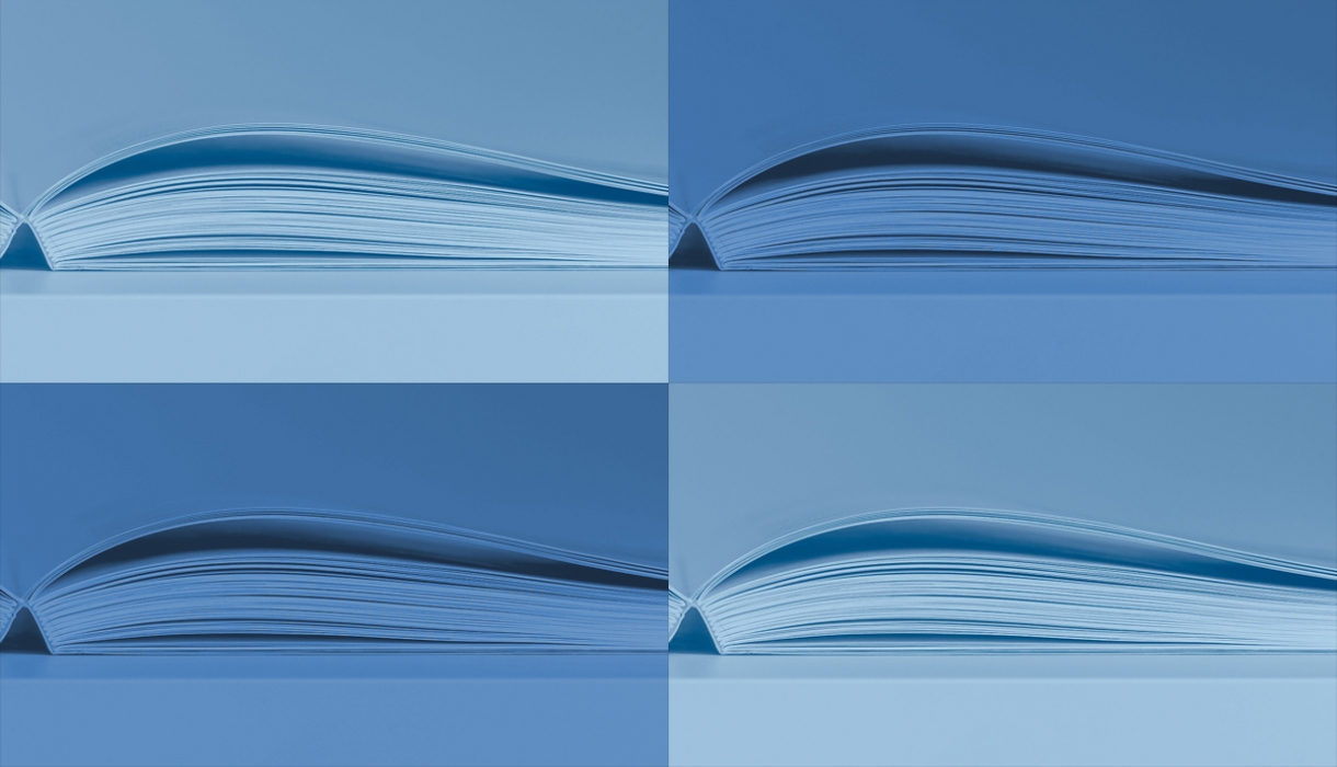 four side views of book pages