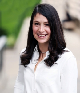Dorothy Lund standing outside and smiling