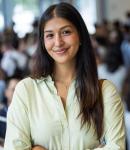 Suzy Kadir in light-colored blouse