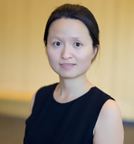 Portrait of Sharon Di, a woman with black hair in a black shirt