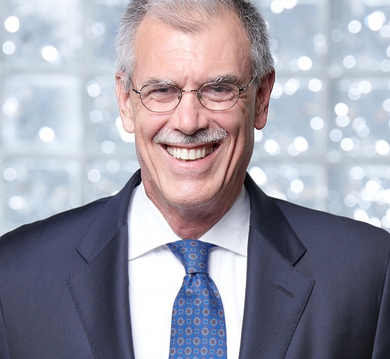 Former U.S Solicitor General Donald Verrilli Jr. in blue suit with a white shirt and blue tie/